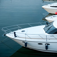 Boats standing on water